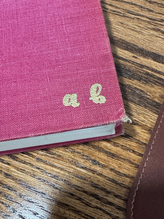 Embossed initials